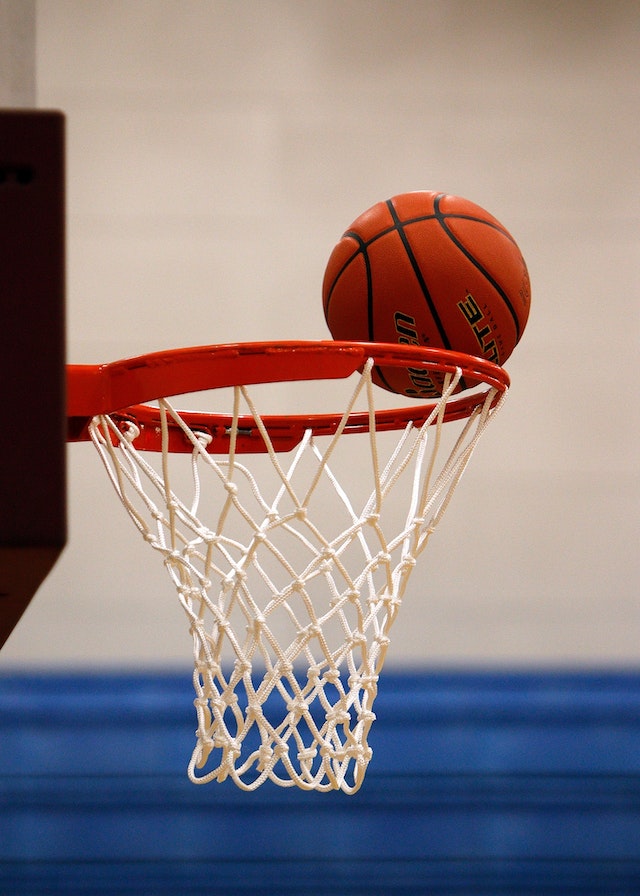Basketball going through a hoop
